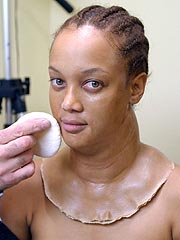 Tyra Banks Models Fat Suit for Show