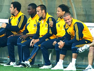 David Beckham Watches Team from Sidelines