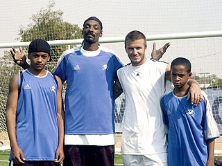 Beckham Teaches Snoop Dogg's Pups to Play Soccer