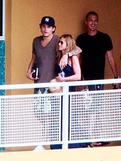 Jennifer Aniston and John Mayer Get Cozy Poolside