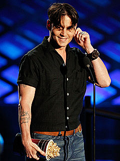 Johnny Depp Takes Two MTV Movie Awards