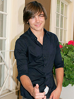 Zac Efron Gets Comfortable with a Female Clubgoer