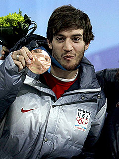 Olympian Scotty Lago Heads Home After Photo Controversy