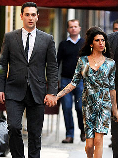 Amy Winehouse Steps Out with Dapper New Beau