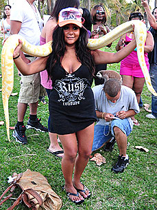 Spotted: 'Jersey Shore' Star Snooki Charms a Snake