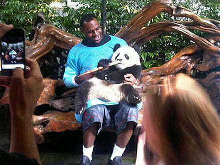 LeBron James Cuddles a Panda Cub in China (PHOTO)
