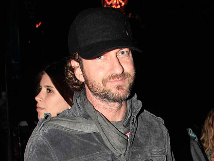 Gerard Butler Paints a Sexy Mural at Coachella Party