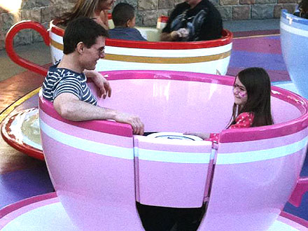 Tom Cruise & Suri Ride the Tea Cups at Disneyland