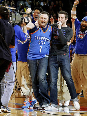 Basketball Fan Makes Half-Court Shot – And Wins $20,000 for Wife's Medical Bills