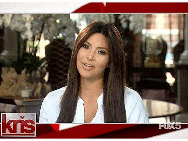 Kim Kardashian Appears via Video to Say She's 'Loving Life at Home'