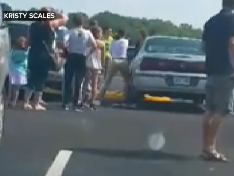 Woman Smashes Window to Free Toddler Trapped in Hot Car
