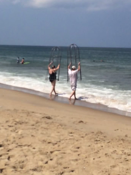 Couple Wear Personal 'Shark Cages' at North Carolina Beach