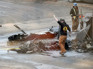 Alaska Pilot Killed as Small Plane Crashes into Building Where His Wife Worked