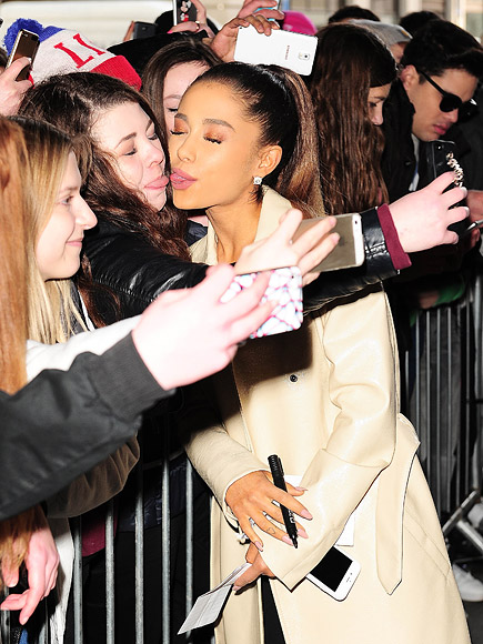 Ariana Grande Nearly Touches Tongue With Fan