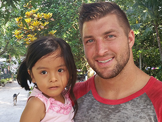 Go Behind the Scenes of Tim Tebow's Mission Trip to the Philippines