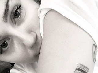 Miley Cyrus Gets a Jar of Vegemite Tattoo: Is Liam Hemsworth Responsible?