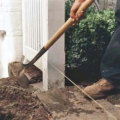 man with shovel in the dirt