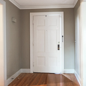 budget redo tidy foyer with wainscoting and hooks before