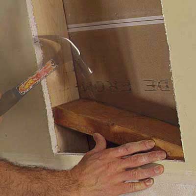 installing 2-by-4 support beams for niche support