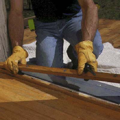 Prepare the sill by removing the adjustable wood strip from the original threshold