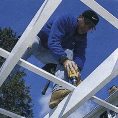 Step 7: Fasten the lattice strips to build an arbor