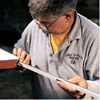 installing the sweep for door weatherstripping