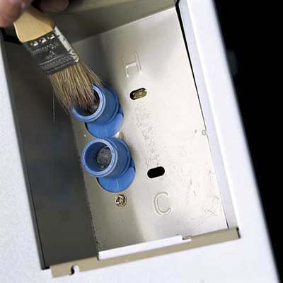 cleaning washing machine filters with bristle brushes