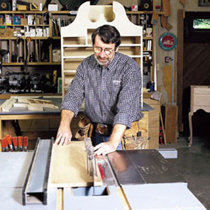 Norm Abram ripping a wide board with a table saw