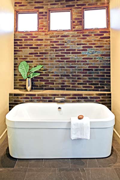 soaking tub, black tile