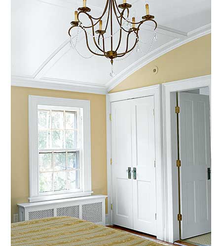 barrel-vaulted ceilings in master bedroom of renovated Georgian