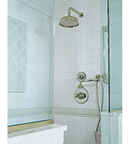 shower with old-world style fixtures in renovated Georgian's master bath