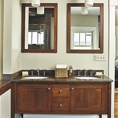 furniture-like wood vanity in master bathrooom