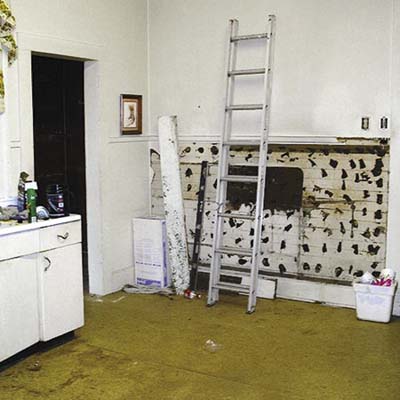 before image of remodeled kitchen with ladder