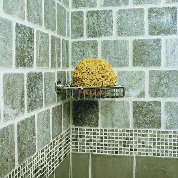 Shower tiled with marble and ceramic tiles