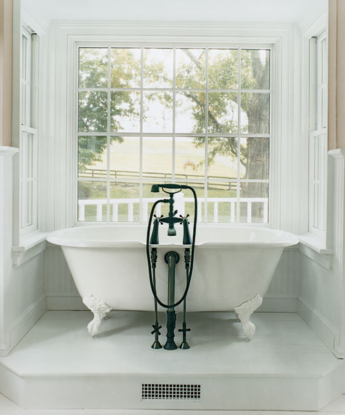 A new tub alcove created from an existing wooden deck bath remodel