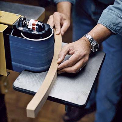 using a profile sander to fair out band-saw unevenness in curved stretchers