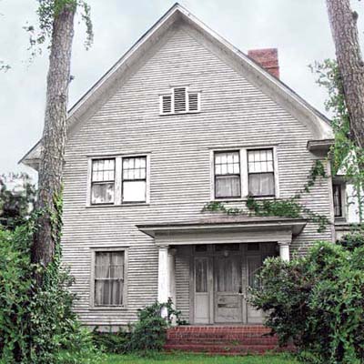 cross-gabled clapboard house