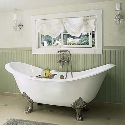 Bathtub under window in shared bathroom