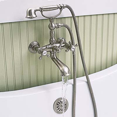 Brushed nickel tub filler in shared bathroom