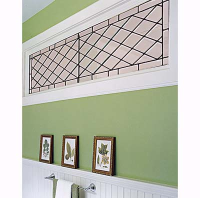 Leaded-glass window in shared bathroom