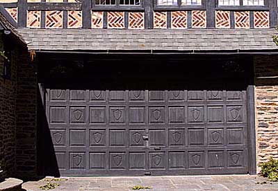 garage door with a tudor style facade