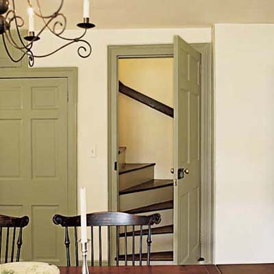 Staircase behind dining room