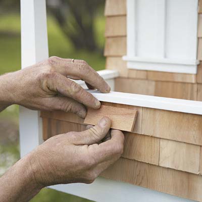 attaching shingles to a craftsman doghouse