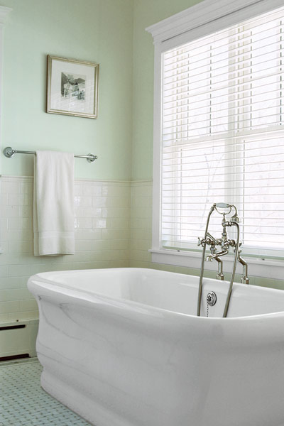 vintage-look tub with edwardian style tub filler