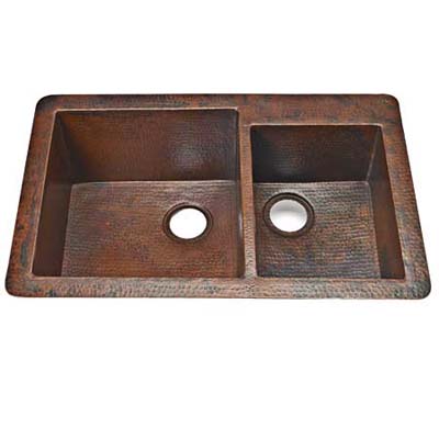 handmade copper sink offers a rugged texture at a price