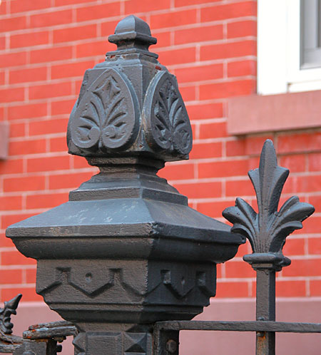 Architectural iron with motif.