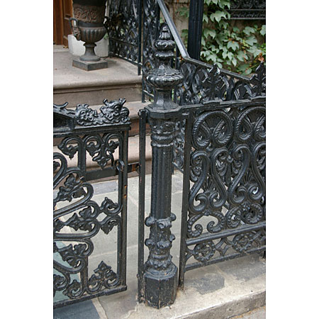 Tall and Thin.  Elaborate but tasteful ironwork. 