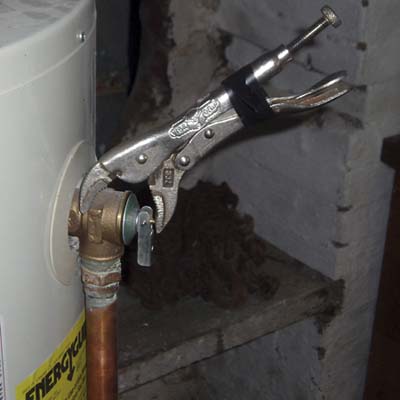 a TPR valve tightened with a pair of locking pliers that are held in place with electrical tape