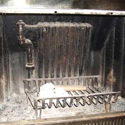 a boiler radiator found in a fireplace