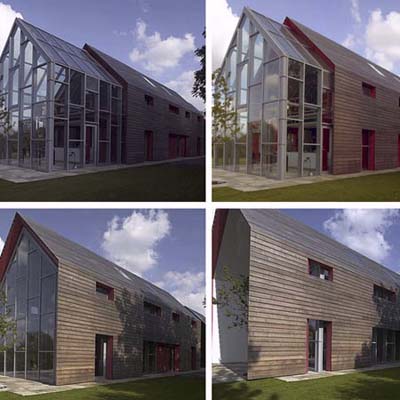 a house in Suffolk, UK with a sliding timber shell